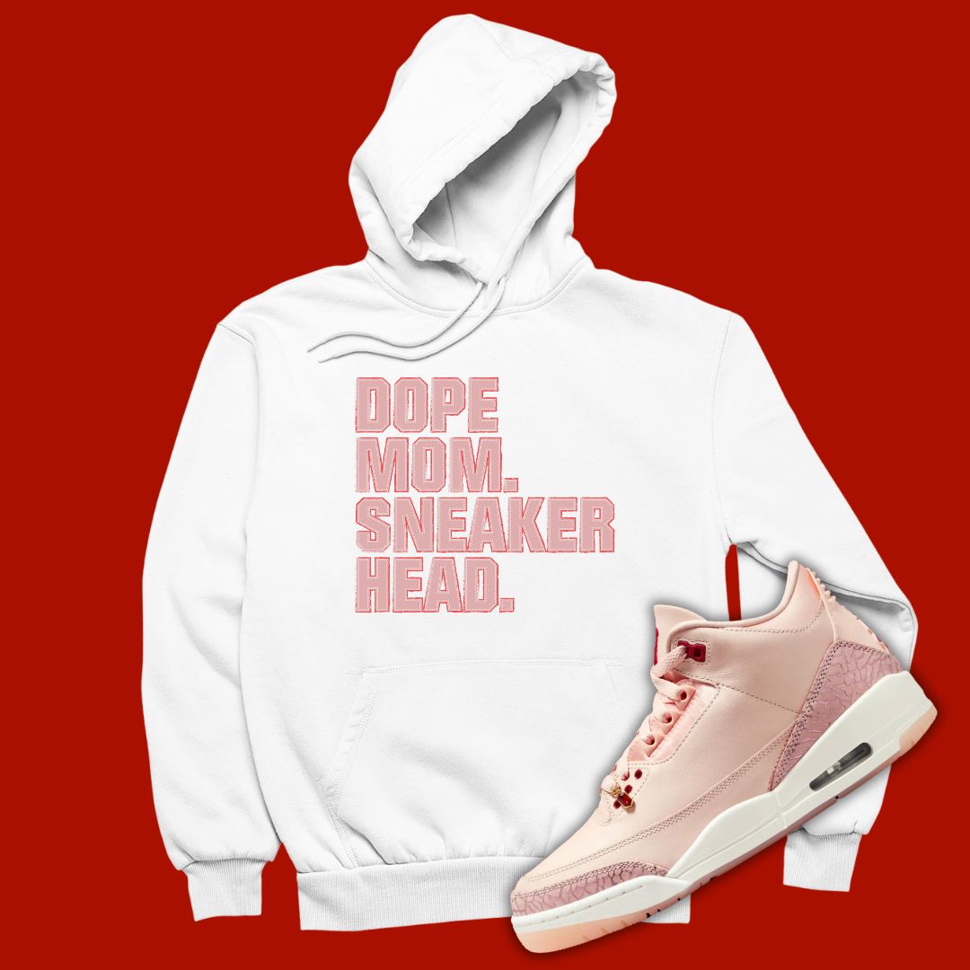 White 'Dope Mom Sneakehead' hoodie designed to match the Air Jordan 3 Valentine's Day 2025, featuring bold typography and sneaker-inspired graphics.