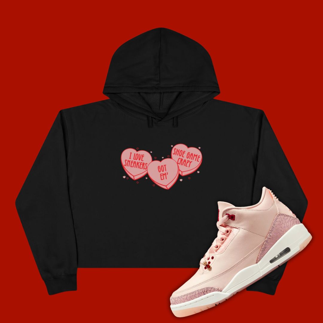 Black 'Candy Heart' cropped hoodie designed to match the Air Jordan 3 Valentine's Day 2025, featuring bold typography and sneaker-inspired graphics.