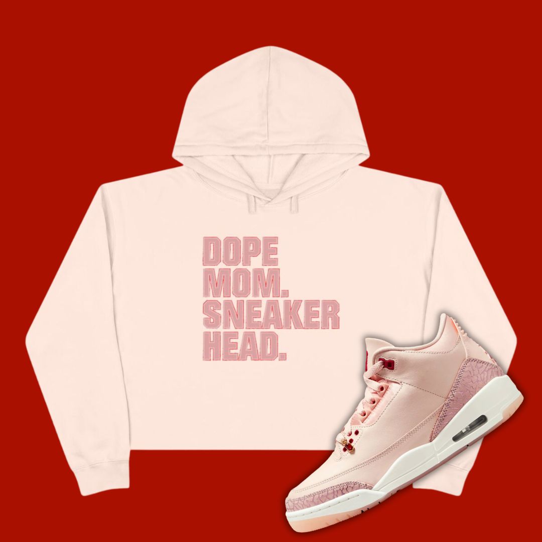 Pink 'Dope Mom Sneakerhead' cropped hoodie designed to match the Air Jordan 3 Valentine's Day 2025, featuring bold typography and sneaker-inspired graphics.